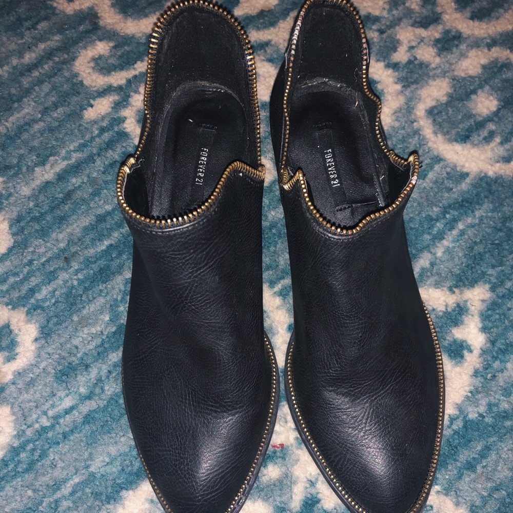 Black ankle booties with zipper detail